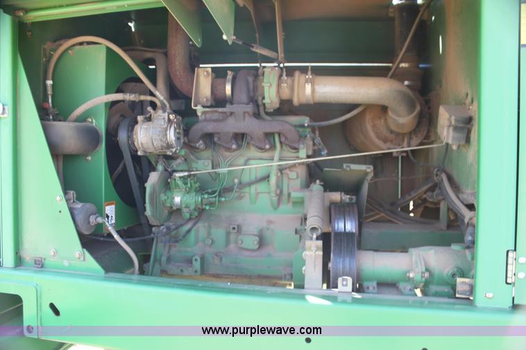 image for item H2147 2004 John Deere 4895 self-propelled swather