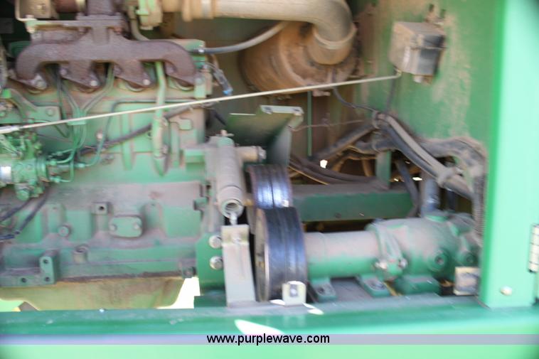 image for item H2147 2004 John Deere 4895 self-propelled swather