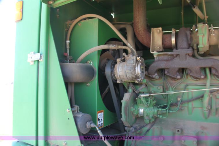 image for item H2147 2004 John Deere 4895 self-propelled swather