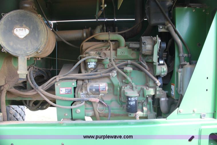 image for item H2147 2004 John Deere 4895 self-propelled swather