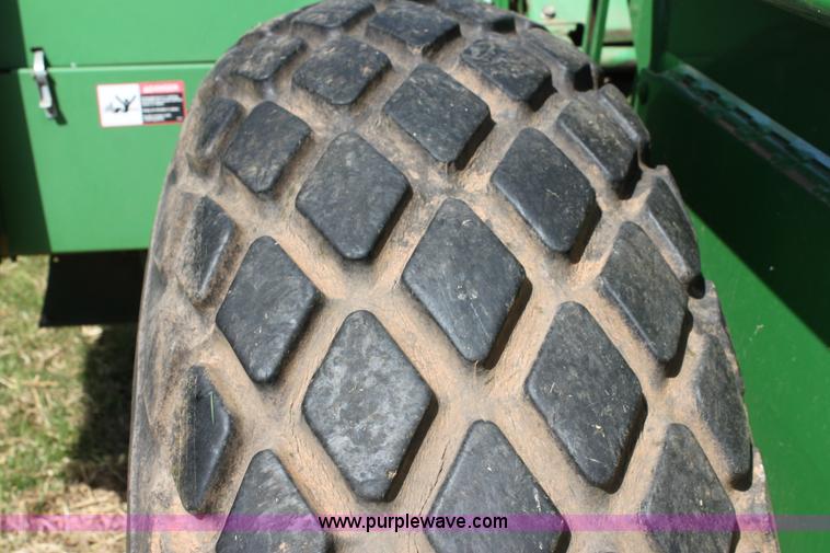 image for item H2147 2004 John Deere 4895 self-propelled swather