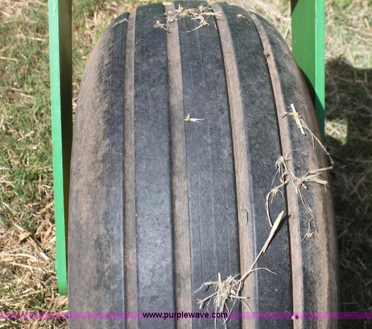 image for item H2147 2004 John Deere 4895 self-propelled swather