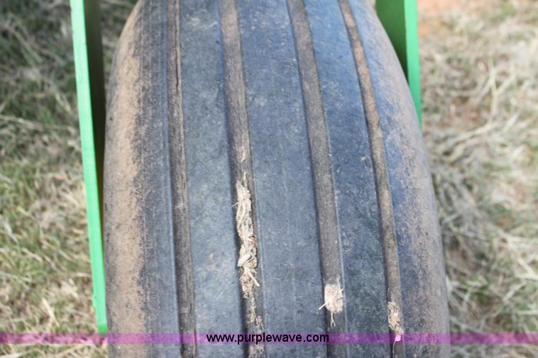 image for item H2147 2004 John Deere 4895 self-propelled swather