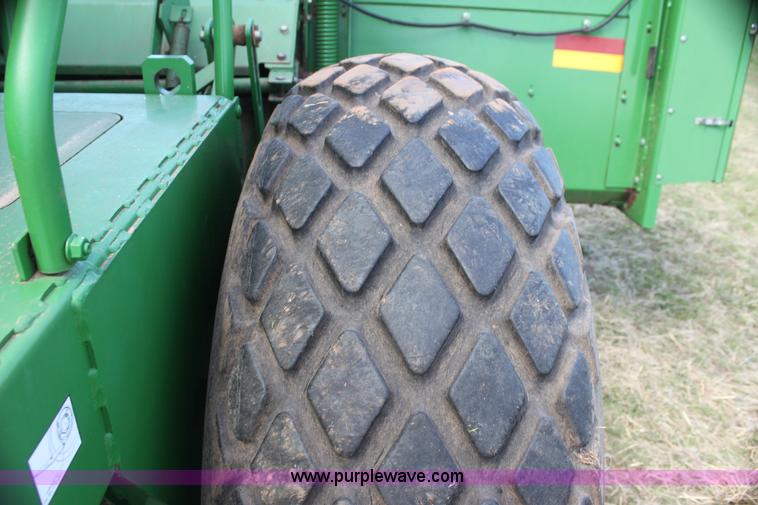 image for item H2147 2004 John Deere 4895 self-propelled swather