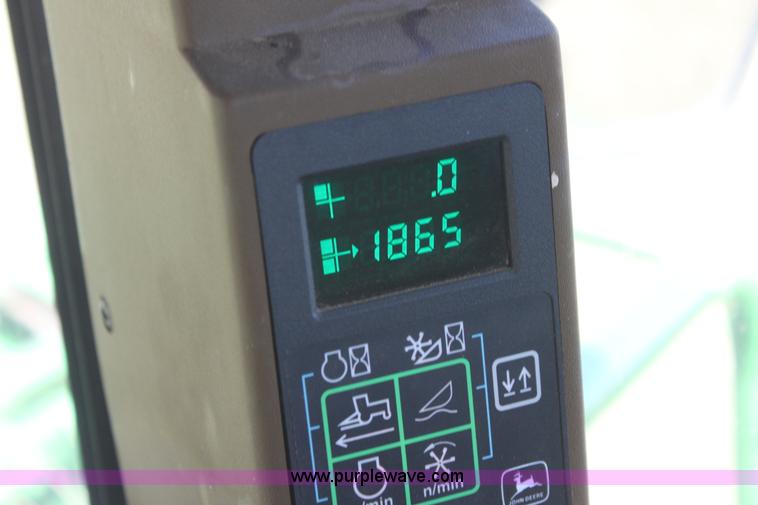 image for item H2147 2004 John Deere 4895 self-propelled swather