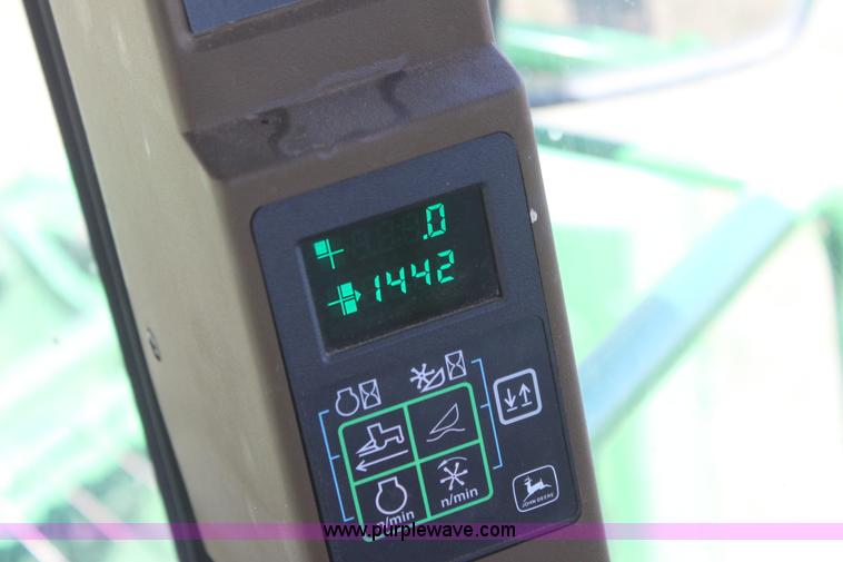 image for item H2147 2004 John Deere 4895 self-propelled swather