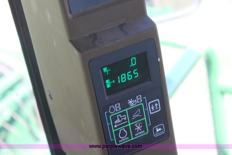 image for item H2147 2004 John Deere 4895 self-propelled swather