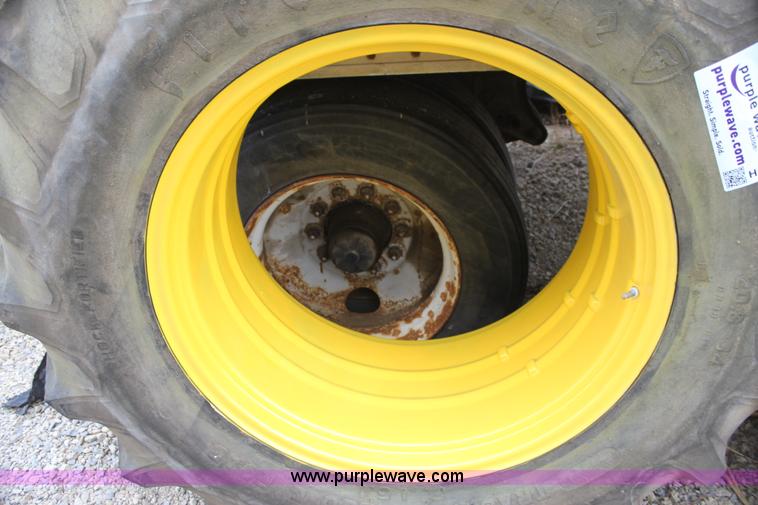 image for item H2175 (2) Firestone 20.8-34 rear tractor tires and John Deere wheels