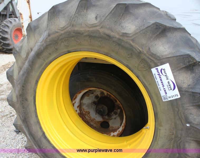 image for item H2175 (2) Firestone 20.8-34 rear tractor tires and John Deere wheels