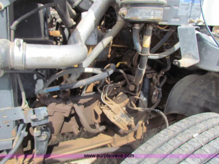 image for item H2211 2004 GMC C6500 grain truck