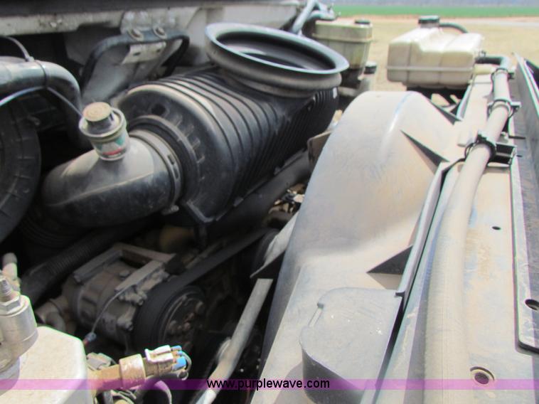 image for item H2211 2004 GMC C6500 grain truck