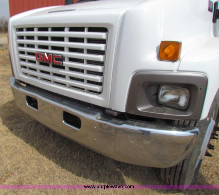 image for item H2211 2004 GMC C6500 grain truck