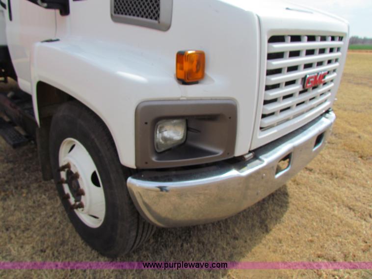 image for item H2211 2004 GMC C6500 grain truck