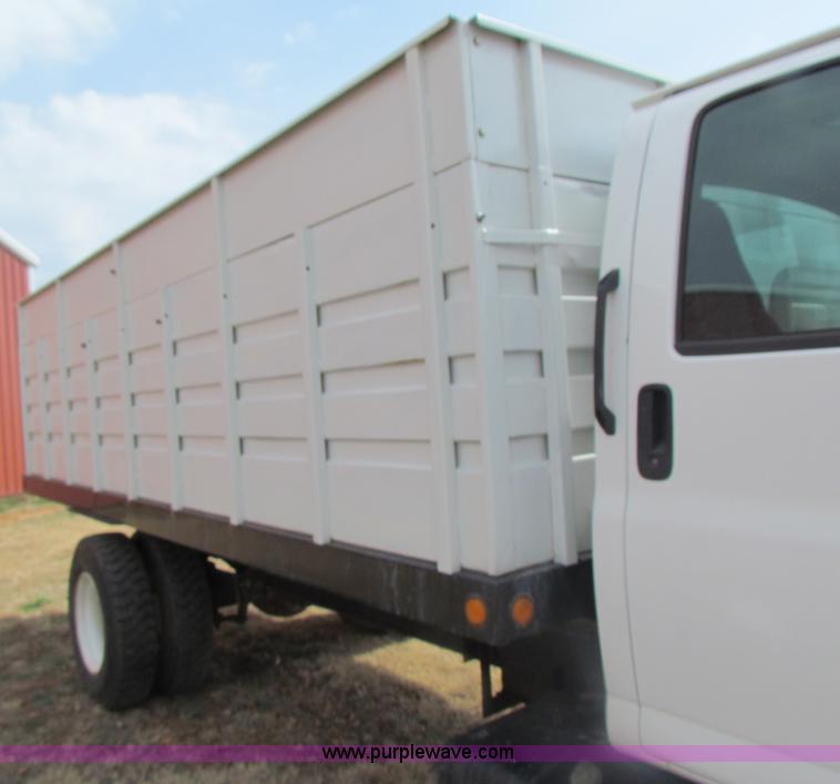 image for item H2211 2004 GMC C6500 grain truck