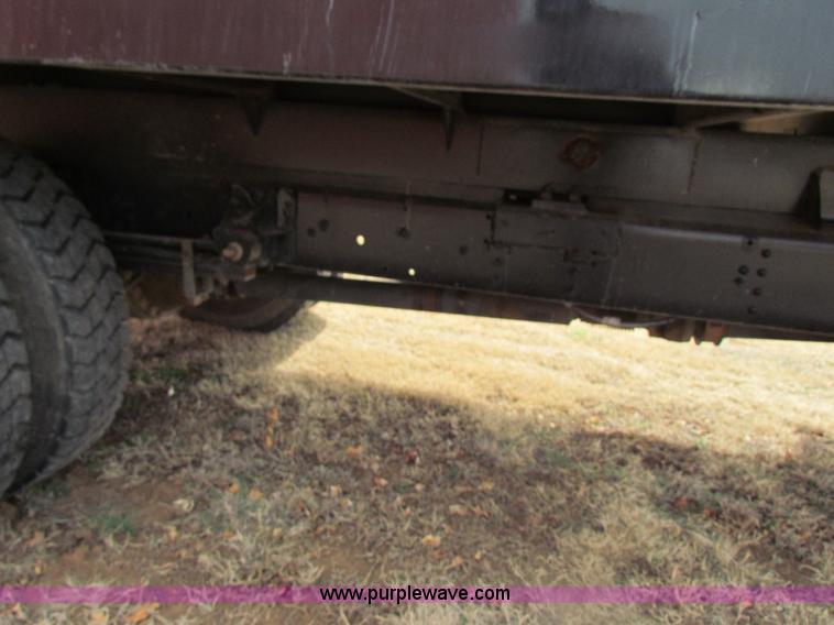 image for item H2211 2004 GMC C6500 grain truck