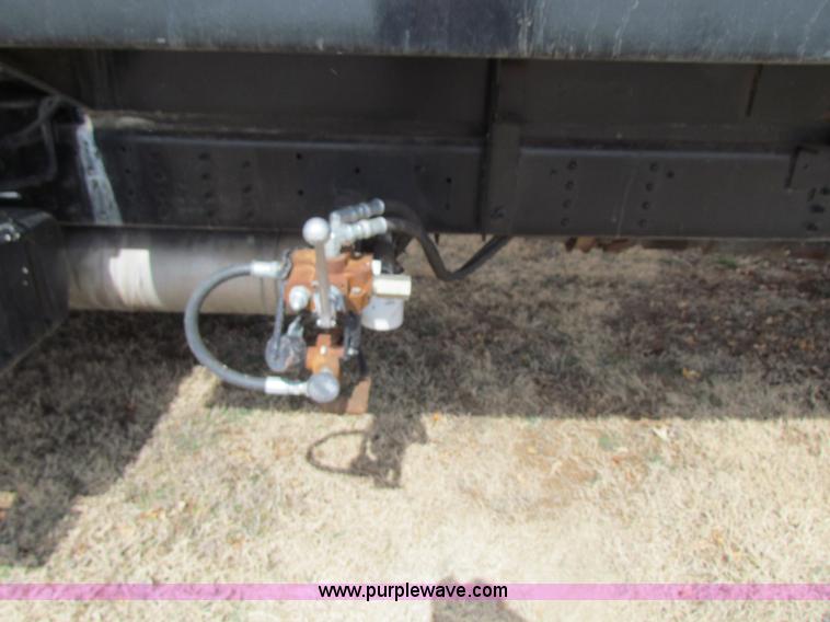 image for item H2211 2004 GMC C6500 grain truck