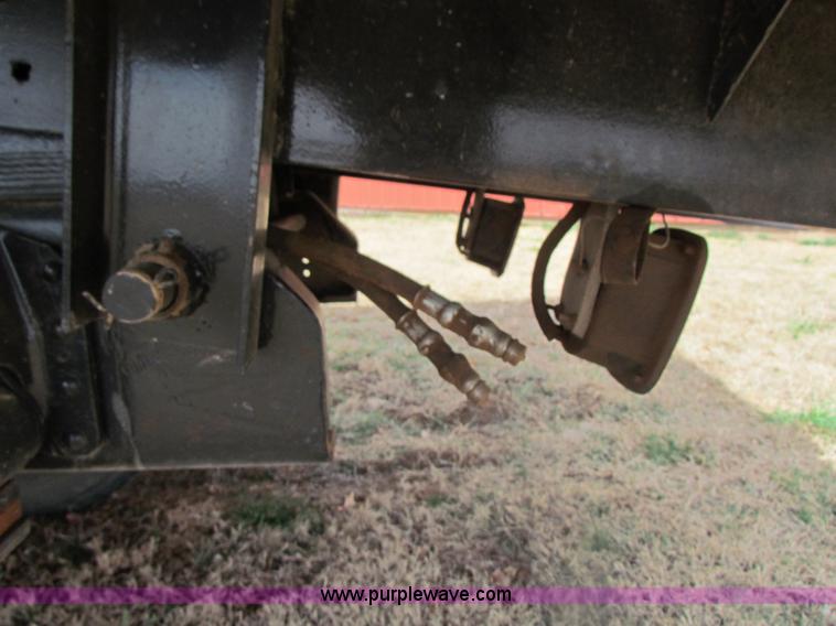 image for item H2211 2004 GMC C6500 grain truck