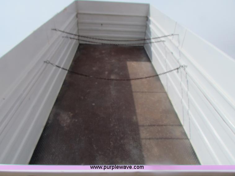 image for item H2211 2004 GMC C6500 grain truck