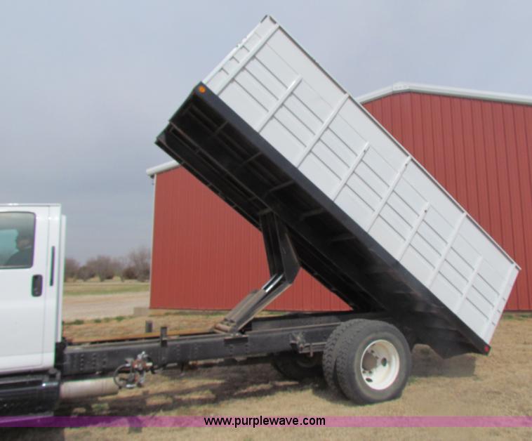 image for item H2211 2004 GMC C6500 grain truck