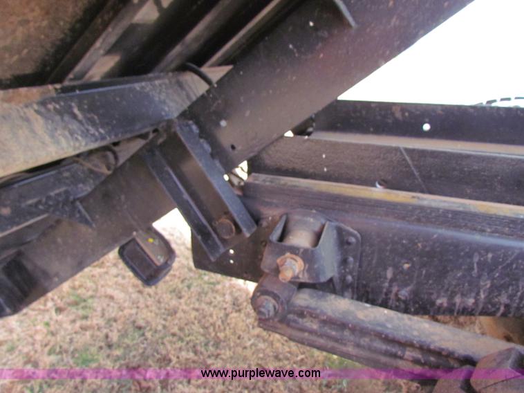 image for item H2211 2004 GMC C6500 grain truck