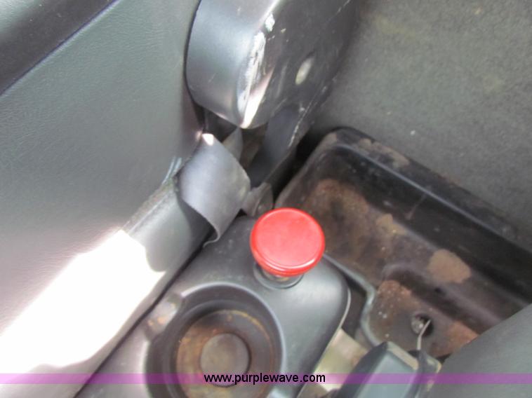 image for item H2211 2004 GMC C6500 grain truck