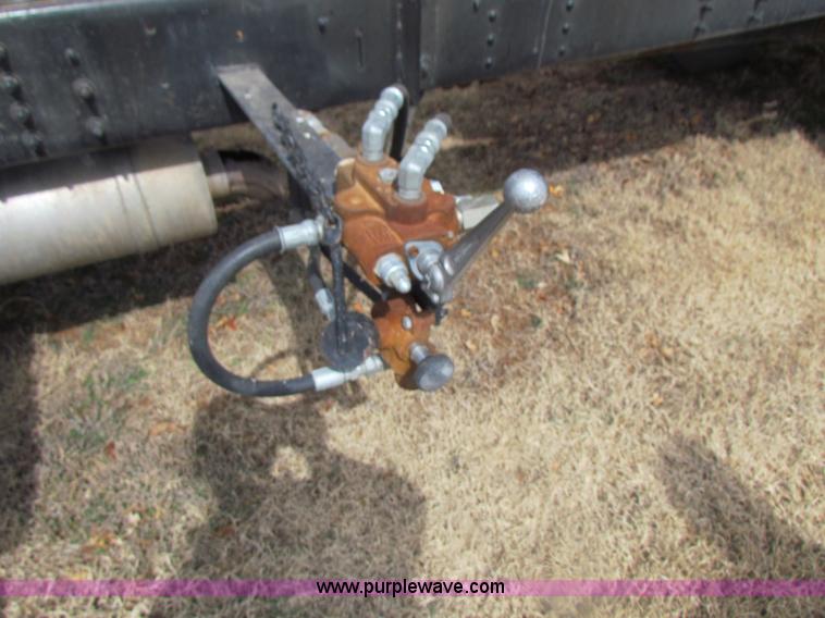 image for item H2211 2004 GMC C6500 grain truck