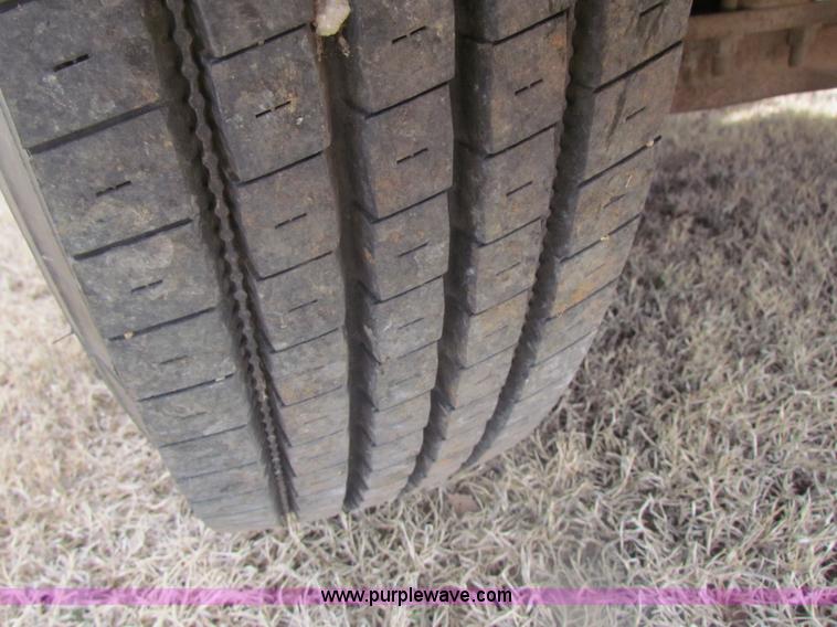 image for item H2211 2004 GMC C6500 grain truck