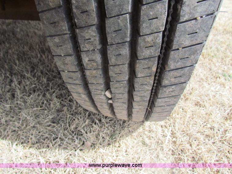 image for item H2211 2004 GMC C6500 grain truck