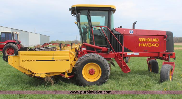 image for item H6090 2001 New Holland HW340 swather