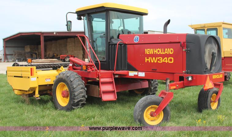 image for item H6090 2001 New Holland HW340 swather