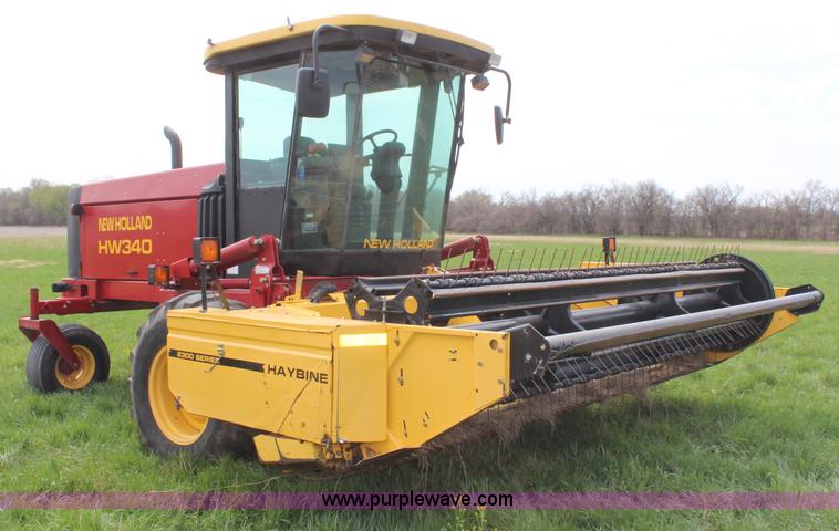 image for item H6090 2001 New Holland HW340 swather