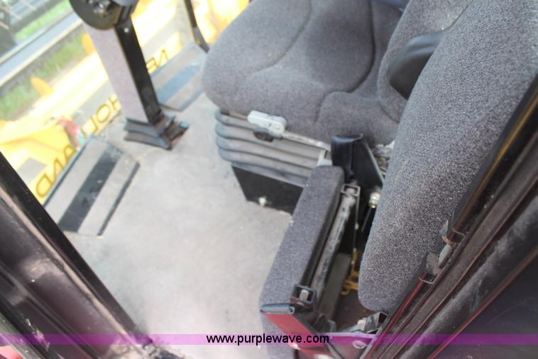 image for item H6090 2001 New Holland HW340 swather