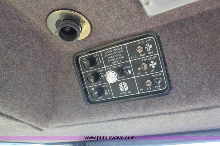 image for item H6090 2001 New Holland HW340 swather