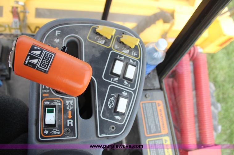 image for item H6090 2001 New Holland HW340 swather