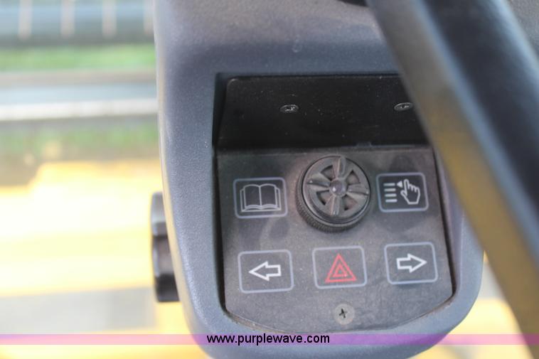 image for item H6090 2001 New Holland HW340 swather