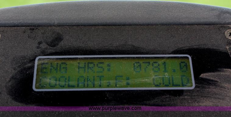 image for item H6090 2001 New Holland HW340 swather