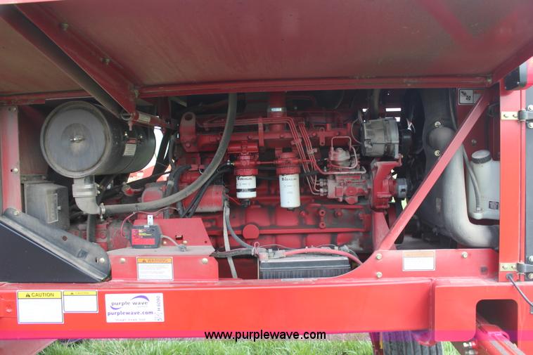 image for item H6090 2001 New Holland HW340 swather