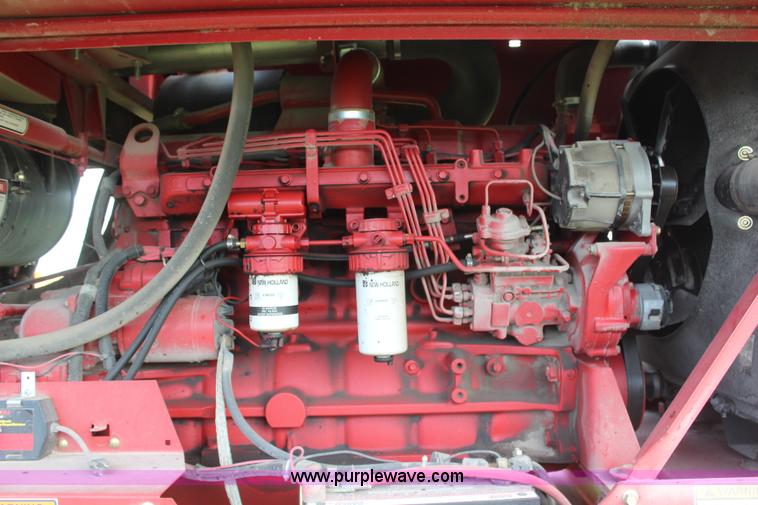 image for item H6090 2001 New Holland HW340 swather