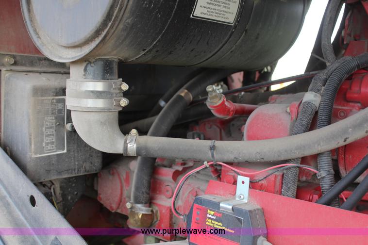 image for item H6090 2001 New Holland HW340 swather