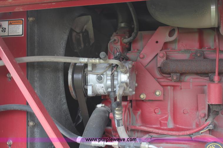 image for item H6090 2001 New Holland HW340 swather