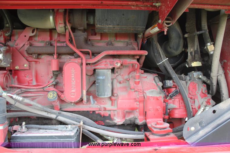 image for item H6090 2001 New Holland HW340 swather