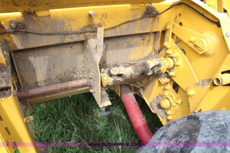 image for item H6090 2001 New Holland HW340 swather