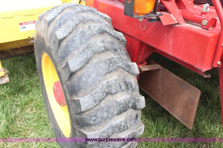 image for item H6090 2001 New Holland HW340 swather