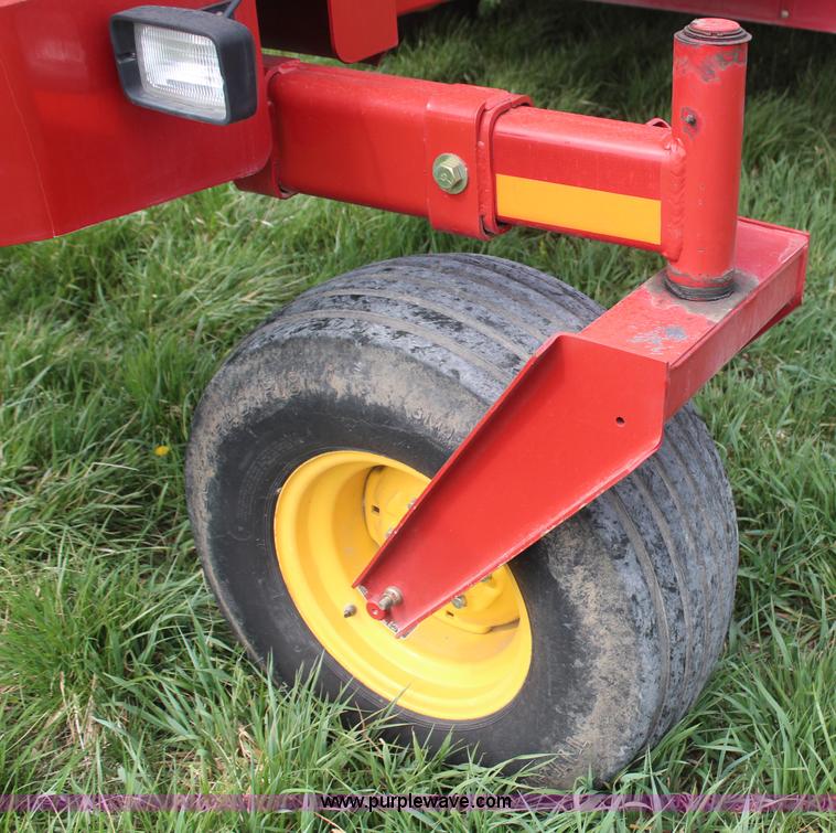 image for item H6090 2001 New Holland HW340 swather