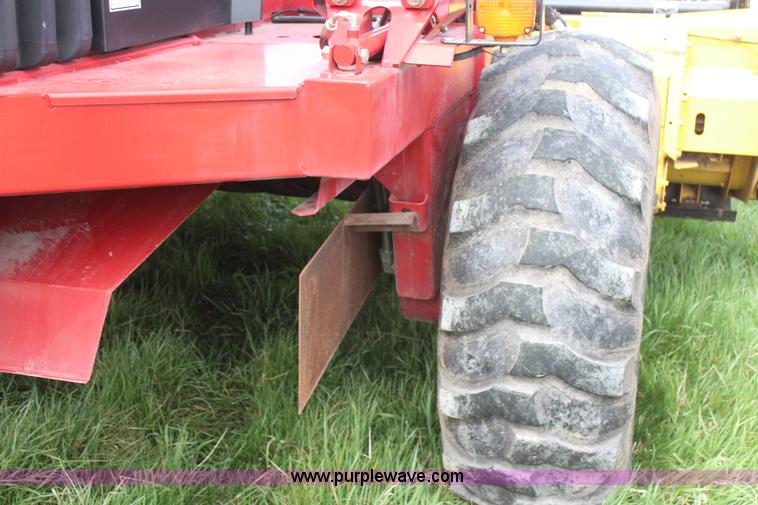 image for item H6090 2001 New Holland HW340 swather