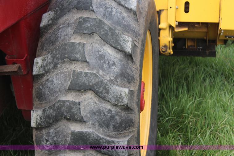 image for item H6090 2001 New Holland HW340 swather