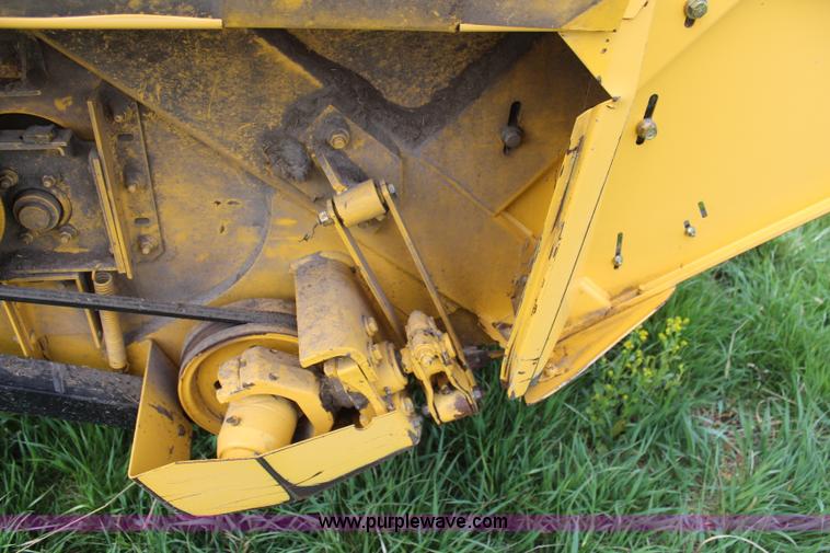 image for item H6090 2001 New Holland HW340 swather