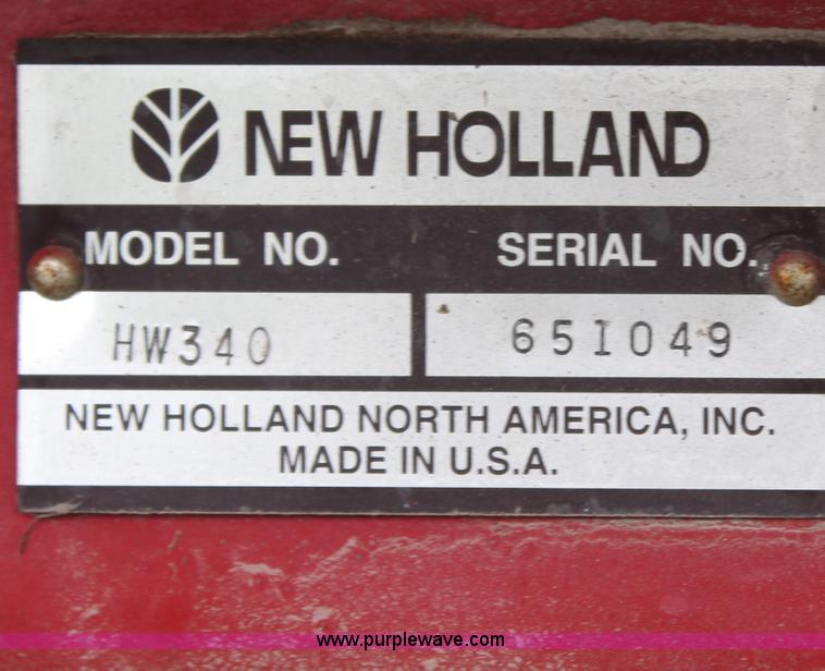 image for item H6090 2001 New Holland HW340 swather