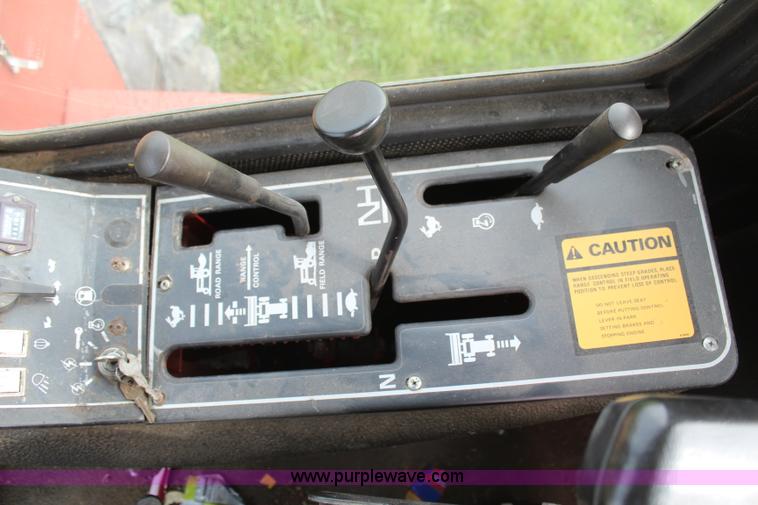 image for item H6091 1990 New Holland 1118 swather