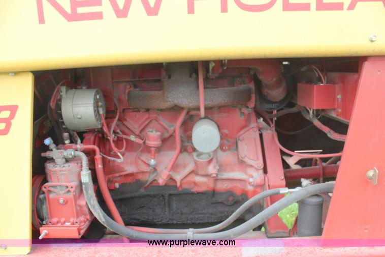 image for item H6091 1990 New Holland 1118 swather